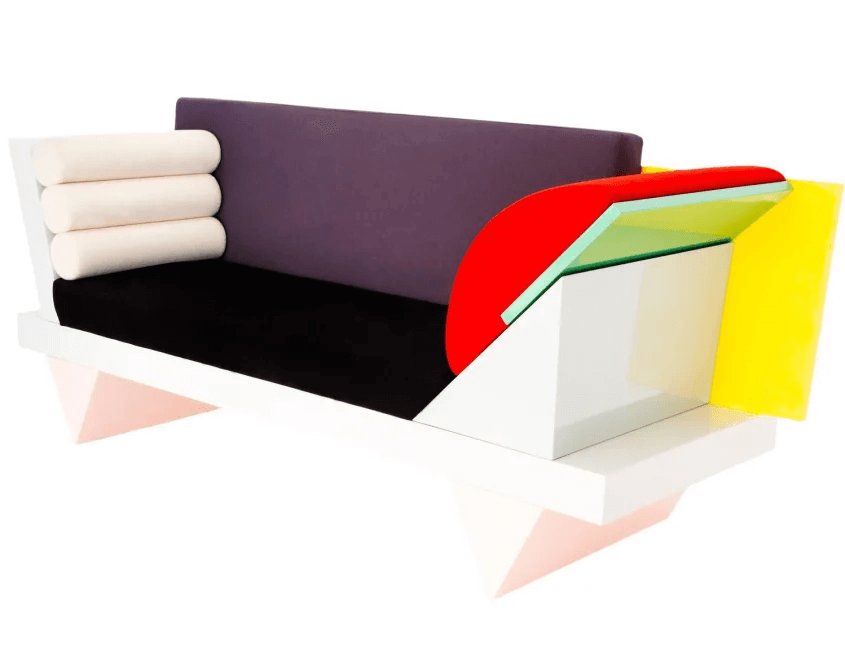 Couch in geometric shapes in white, black, purple, red green and yellow