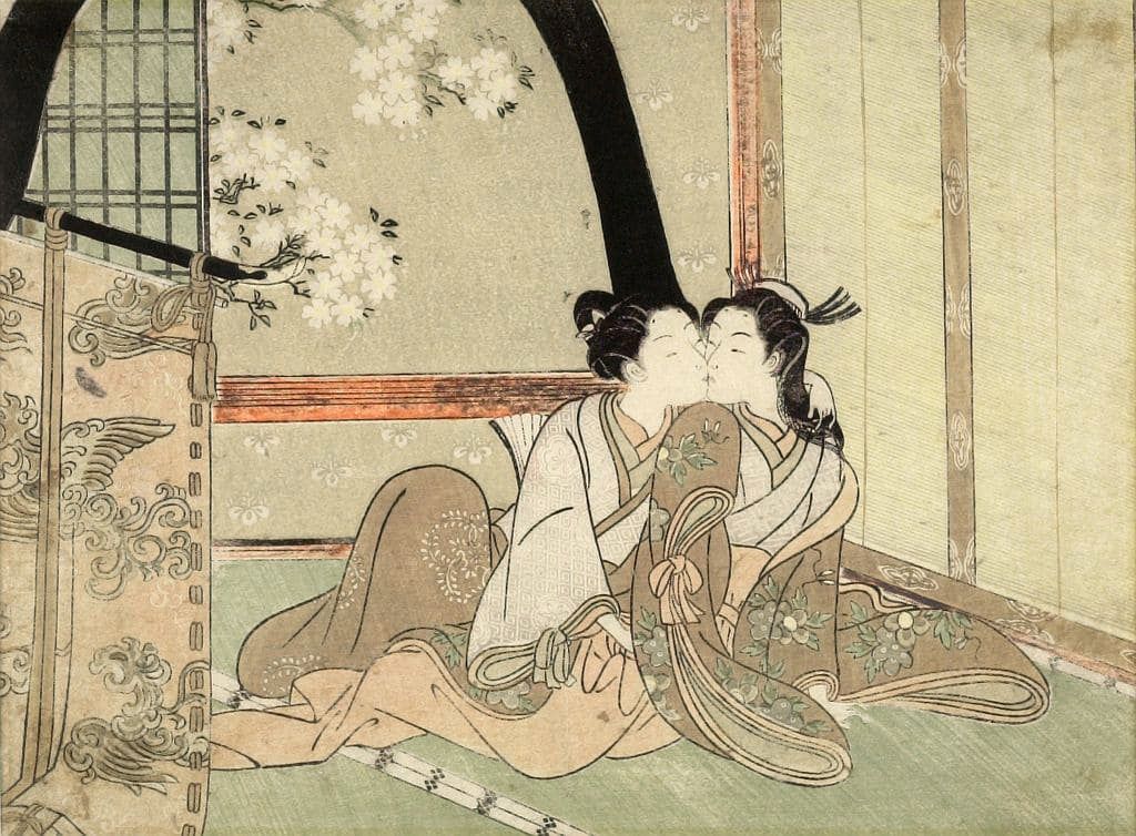 Two Japanese women kissing. 