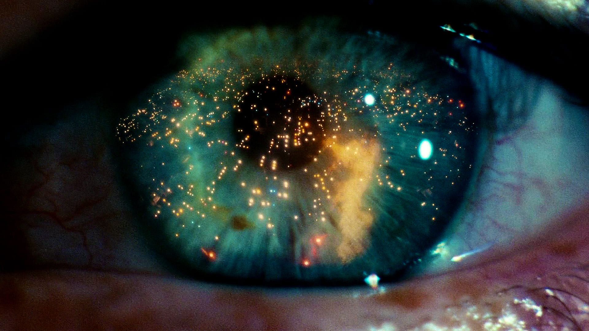 Eye close-up with reflections of an explosion